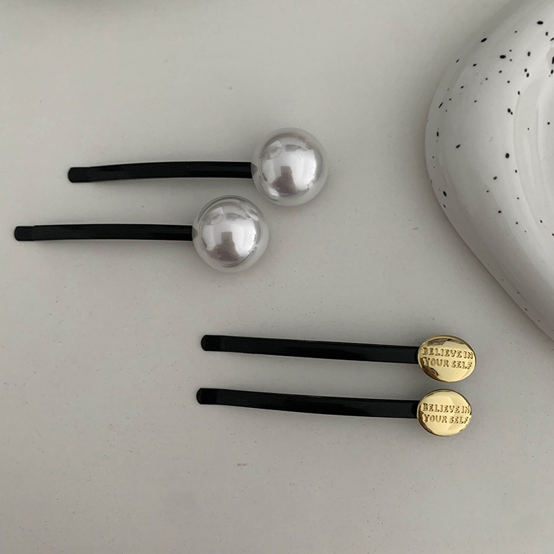 Delicata perla fibbia in oro f - Head Racket Boom recensione e prezzo